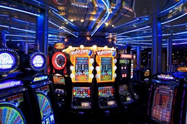 Three Card Poker hand rankings displayed on table